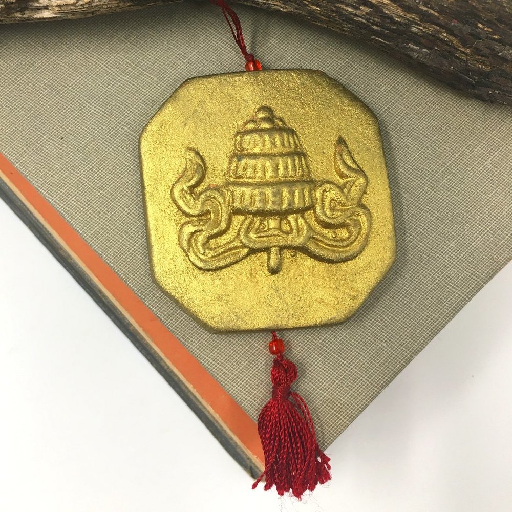 Metallic Matte Gold Hexagonal Ceramic Symbol Pendant with Red Beaded Tassel